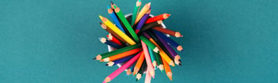 colourful pencils in a jar