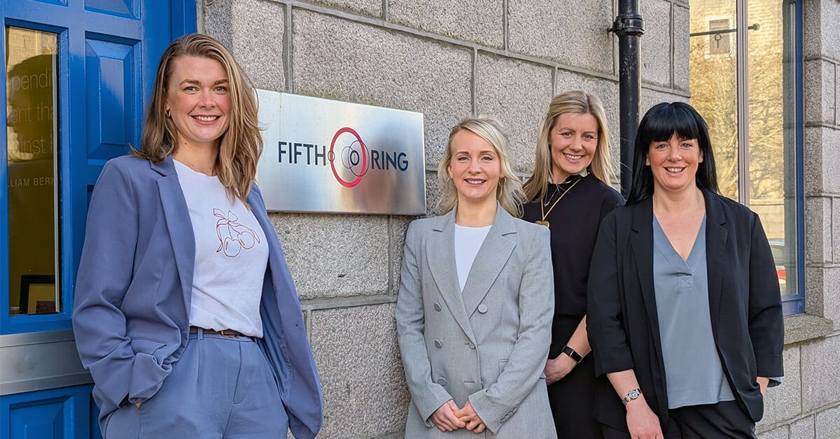 Photo of Jen Maclennan - Group Managing Director, Ashleigh Barbour - PR and Crisis Communications Manager, Eve Ferguson - PR Manager and Nikki Annand - Head of Content in front of Fifth Ring Aberdeen office.