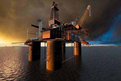 oil rig in sea at sunset