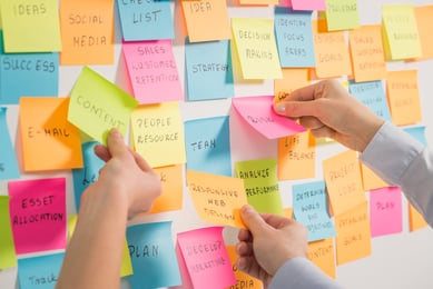 post it notes with marketing phrases